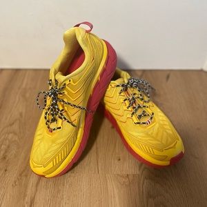 Hoka x Outdoor Voices Clifton shoes in men’s side 10.5, red and yellow color.